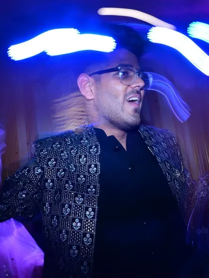 The groom enjoying the dance floor during the Sangeet. We capture the groom's party and their high spirits throughout the celebrations.