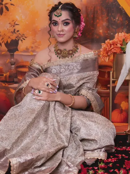 This model is wearing an antique choker with a modern off-shoulder blouse, showing how you can mix and match styles for a unique look.