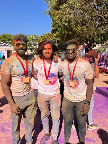 Posing with friends and the team after the color run. These events are a great way to apply the hard work from the gym in a fun, real world setting.