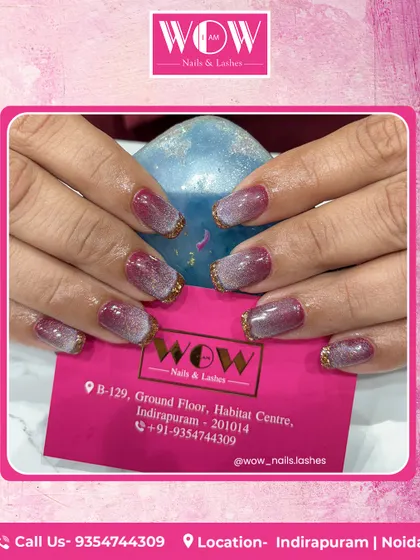 A glamorous take on the ombré trend. This design features a deep red to light pink gradient with a sparkling gold glitter tip.