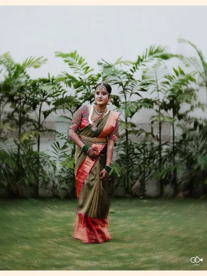A duplicate of the full-length garden portrait of the bride.