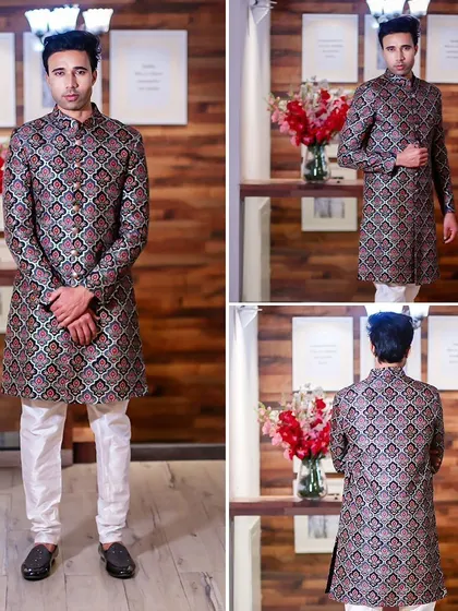 For a more traditional feel, this geometric print sherwani in darker tones offers a sophisticated and grounded look.