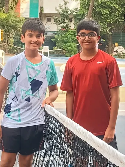 Two young competitors ready at the net, representing the future of tennis at the inter-school MSSA tournament.