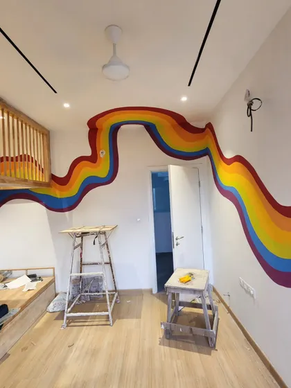 Another angle of the room, showing the full path of the rainbow from one side to the other.