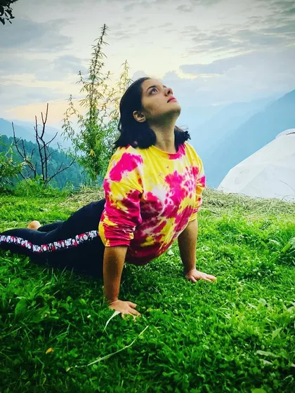 Here I am demonstrating Bhujangasana (Cobra Pose) outdoors. This pose is excellent for strengthening the spine and toning the abdomen.