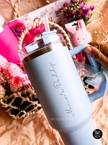 A matching personalized powder blue 'Mama's & Daddy' sipper, perfect for the new dad to stay hydrated.