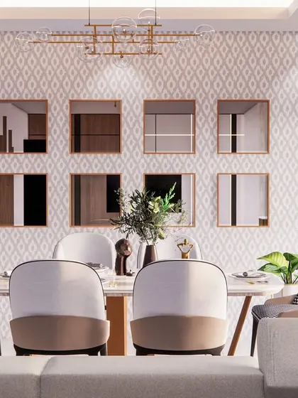 A direct view of the dining area, where mismatched chairs and a patterned wallpaper create a playful yet sophisticated look.