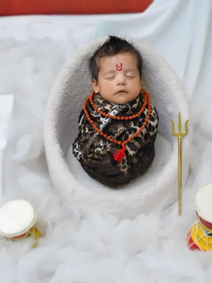 A unique and divine 'Little Shiva' theme for a newborn session. I offer a wide range of creative and cultural themes to make your baby's first photoshoot truly personal and special, all done safely in the comfort of your home.