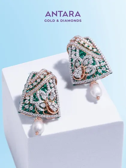 A detailed shot of the Bandhani-inspired earrings, showcasing the intricate setting of emerald beads and diamonds.