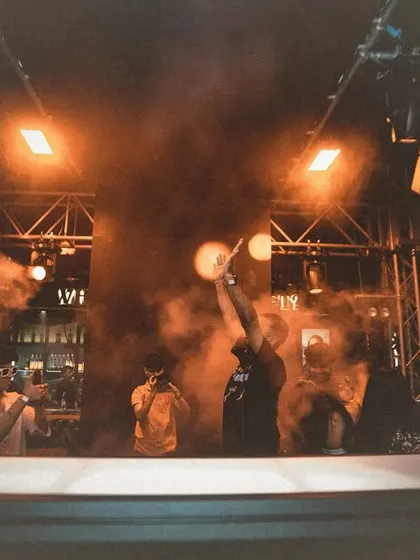 The moment the smoke cannon goes off at "The Secret Project," obscuring the stage in a dramatic cloud.