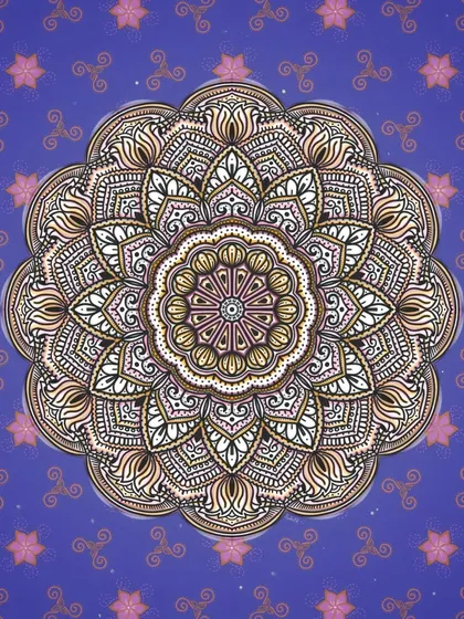 A beautiful, detailed mandala created with soft colors against a rich purple background, marking my return to art in the new year.