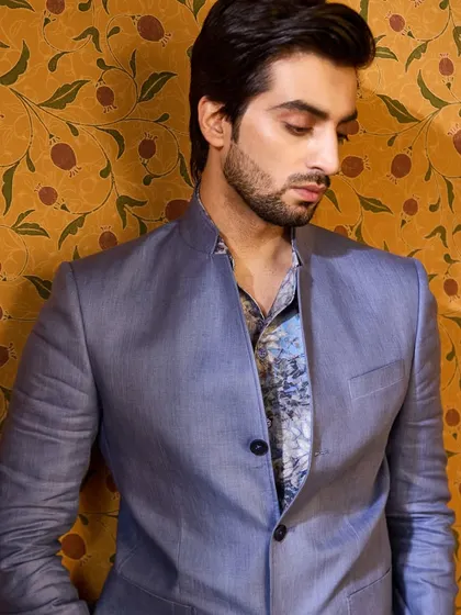 A closer look at the blue linen jacket, layered over a printed shirt. This shows how my pieces can be styled to reflect your individual taste.