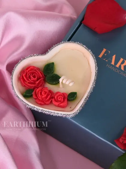 Another of my heart-shaped candle designs, this one with tiny red roses and a silver glitter edge. It comes ready for gifting in a beautiful box.