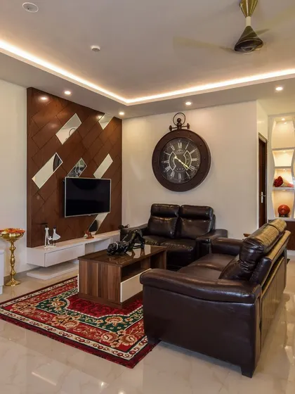 A duplicate of ID 80, this image shows the full living and dining area with its custom-lit display unit and sophisticated false ceiling design.