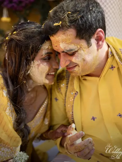 An intimate moment between the couple during their Haldi, a quiet connection amidst the joyful celebration.