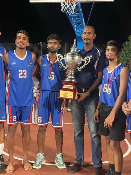 With my coach and teammates, holding the runner-up trophy.