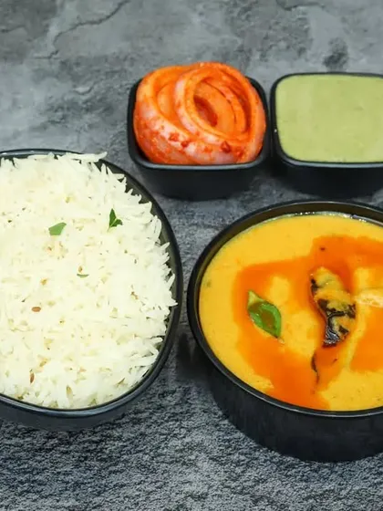 A hearty bowl of my homestyle chicken curry served with steamed rice. It's the perfect non-vegetarian meal for when you're craving something satisfying and delicious.