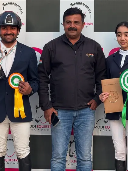 Success is a team effort. Our riders celebrating their wins with a coach, showcasing the supportive community and expert guidance that is the backbone of Team VEA.