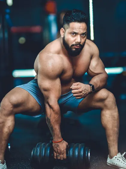 Bloodline warrior. A powerful pose with a dumbbell.