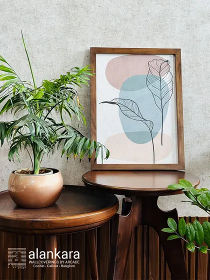 My custom wall art service allows you to transform your space with sophistication. This abstract leaf line art, set in a simple wooden frame, adds a touch of modern, organic beauty.