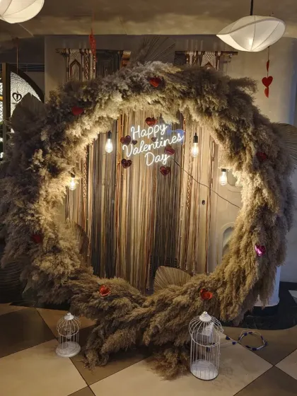 Another angle of the pampas grass Valentine's ring, showing the little heart details and birdcage props I added.