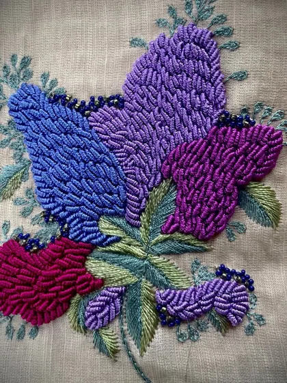 In my fashion studio, artisans have meticulously crafted this exquisite hand embroidery, showcasing a beautiful blend of knot work and thread painting.