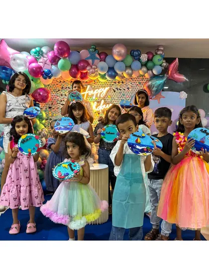Look at this amazing group of young artists with their finished under-the-sea themed plates. The party was a huge success, filled with color, creativity, and lots of happy faces.