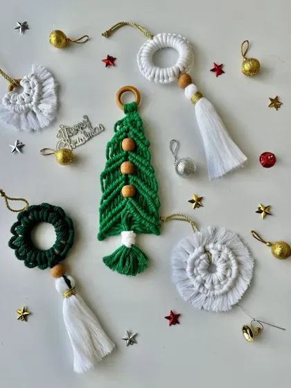 A flat lay of some of my favorite macrame ornaments for the Christmas season.