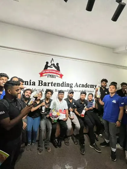 Students and instructors celebrating together after a workshop or competition.