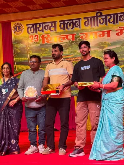 Our instructors being felicitated for their role as judges at the local community event.