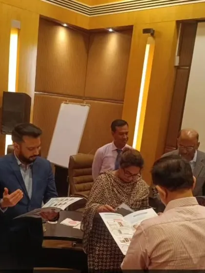 Reviewing materials at the Dermavidya launch event. Collaborative platforms like this are essential for ensuring that dermatologists across the country have access to the best and most current information.
