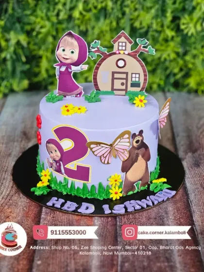A sweet Masha and the Bear cake for Ishwari's 2nd birthday. The purple cake with edible characters and butterflies is a lovely choice for a toddler's party.