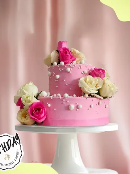 Alekhya's birthday in Panchsheel Park called for something special, like this two-tier pink floral cake. Adorned with beautiful roses and delicate pearls, it was the perfect centerpiece for her celebration.
