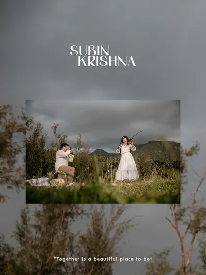 A stunning landscape pre-wedding shot styled as a poster, with the couple and a violin against a dramatic sky.