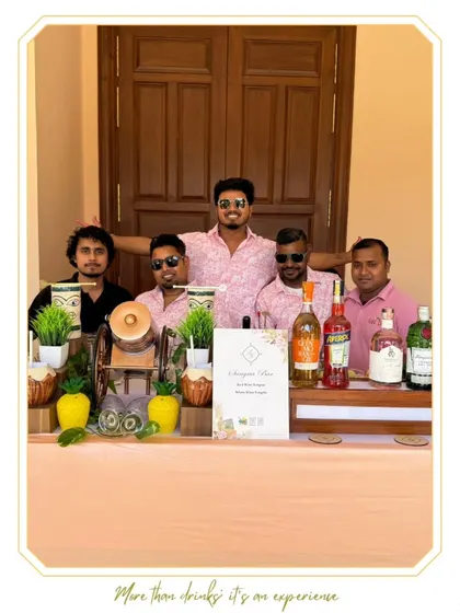Our bartenders in matching pink shirts for a themed brunch event, showcasing our attention to detail and coordination.