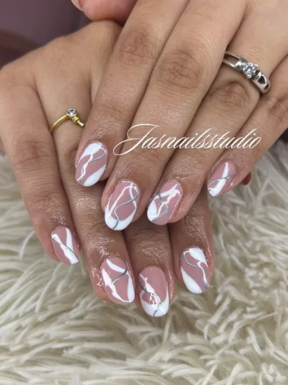 A beautiful abstract design using white and silver lines over a neutral pink base. It looks like delicate marble.