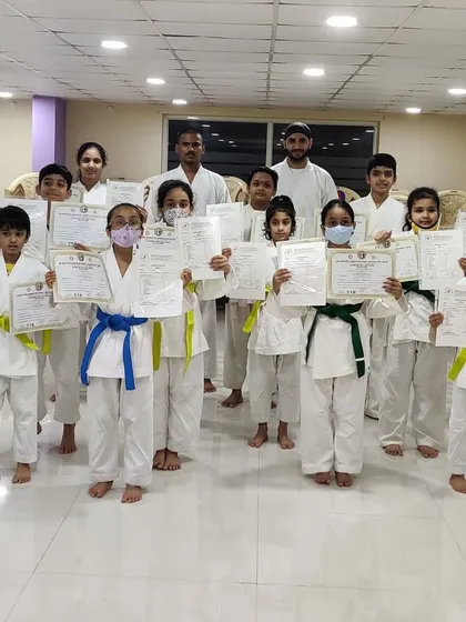 Our third batch of students for the year proudly holds up their certificates after passing their belt test. We ensured all safety protocols were followed during the exam.