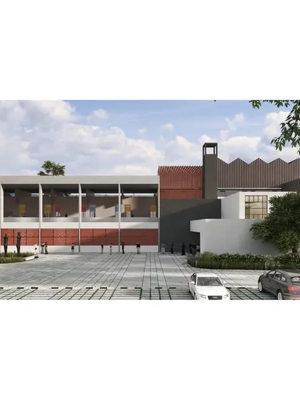 A render for a proposed institutional building in Coimbatore. The design features a grand, colonnaded structure that creates a sense of civic importance, combined with modern materials and a focus on natural light.
