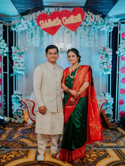 A classic, formal portrait of the couple on their engagement day.