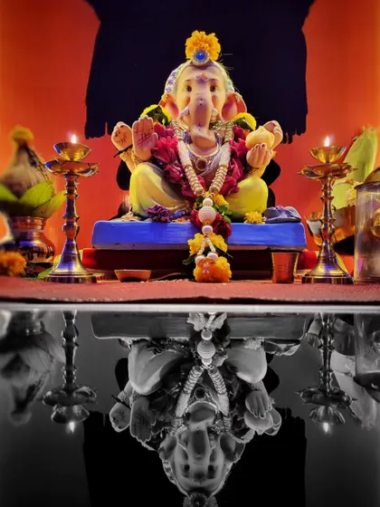 A creative edit of the reflection shot, where the reflection is in black and white. This color pop technique draws all the attention to the vibrant, colorful idol of Lord Ganesha.