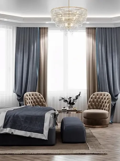 This luxurious master bedroom is designed for comfort and elegance, with a large bay window area perfect for a cozy seating nook. The combination of plush fabrics, sophisticated lighting, and a calm color scheme creates a truly restful retreat.