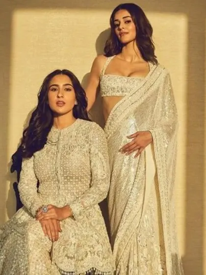 Sara Ali Khan and Ananya Panday show two ways to wear ivory. I can create a similar sharara set or an elegant saree, customized to your preference.