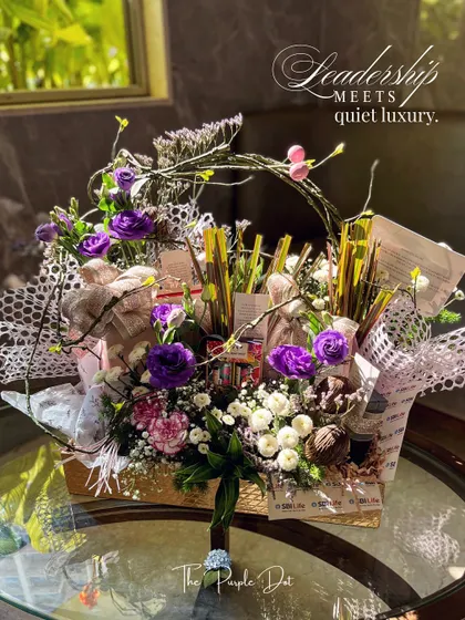 This forest-garden composition is where leadership meets quiet luxury. I created this hamper for a senior executive, layering it with personalized leadership quotes, curated textures, and blooms that reflect depth and presence. It’s a perfect example of gifting that speaks with intention, not volume.