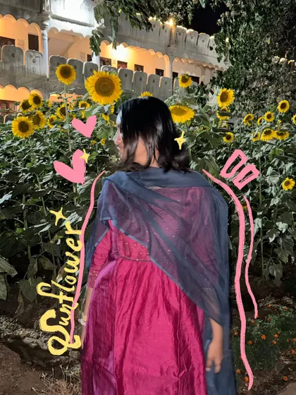 Sunflowers and sarees. A perfect combination, made even better with some cute pink heart doodles.