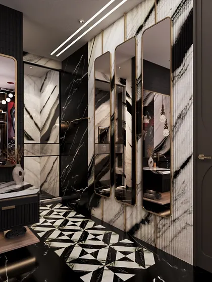 A series of vertical mirrors reflects the bold patterns of the room, enhancing the sense of drama and space. The design is curated to feel entirely unforgettable.