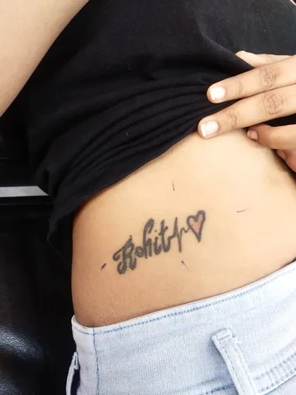 Before: This client wanted to cover a name and heartbeat tattoo on their side.