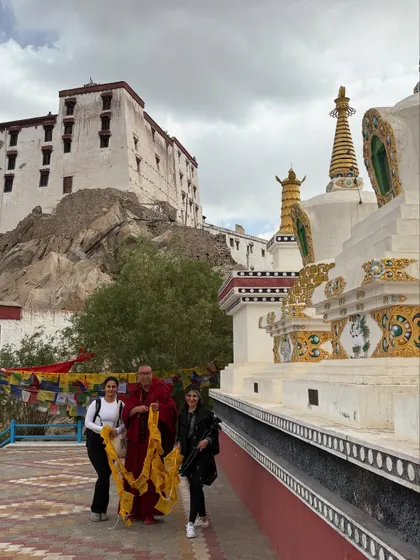 Sharing a moment with a monk at Thiksey Monastery. These cultural exchanges are a vital part of the retreat, offering a glimpse into the deep spiritual heritage of Ladakh.