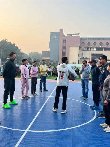 Here I am explaining a drill to parents during our Fun Match. These events are a fantastic way to involve the entire family and share the joy of sports.