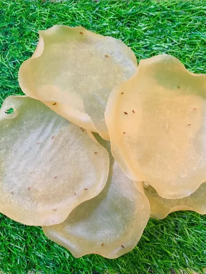 A close-up of my homemade rice papad, or khichiya. You can see the jeera (cumin seeds) embedded in the papad, which adds a lovely flavour when fried.