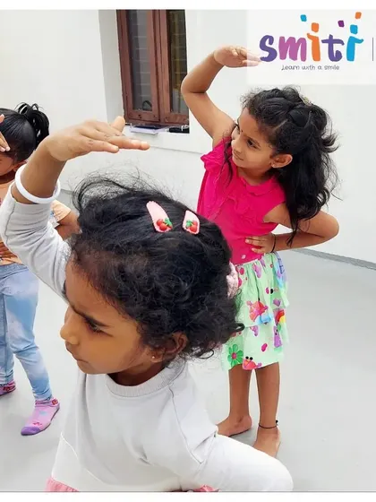 Children practice dance moves, a fun way to improve balance, rhythm, and self-expression.